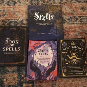 Enchanting Spellbook Collection with Black and Purple Covers
